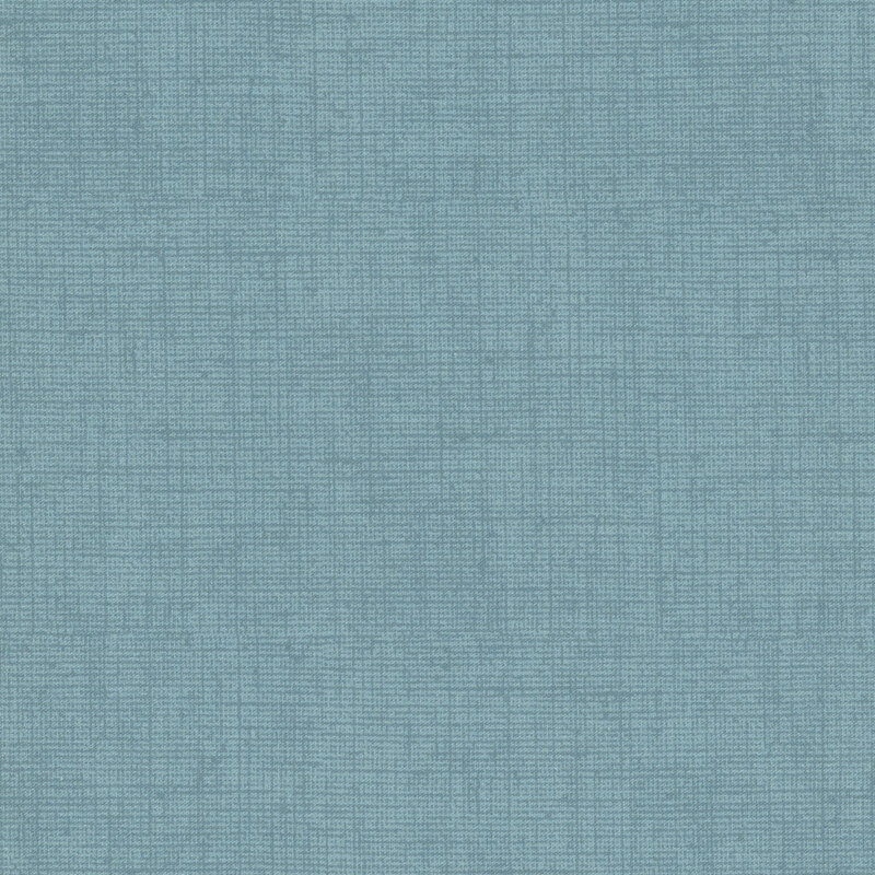 Cottage Blue fabric with a woven texture.