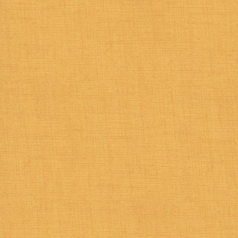 Gold fabric with a woven texture.