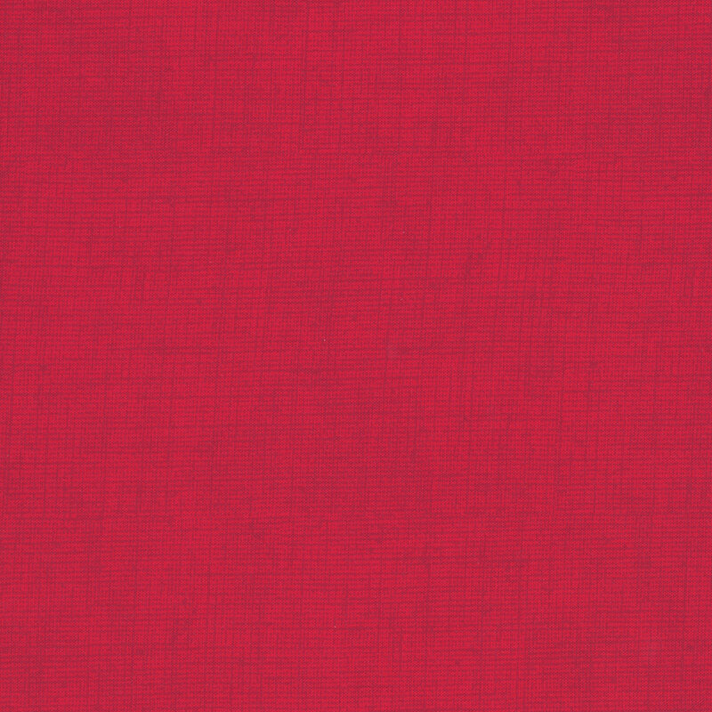 Cherry fabric with a woven texture.