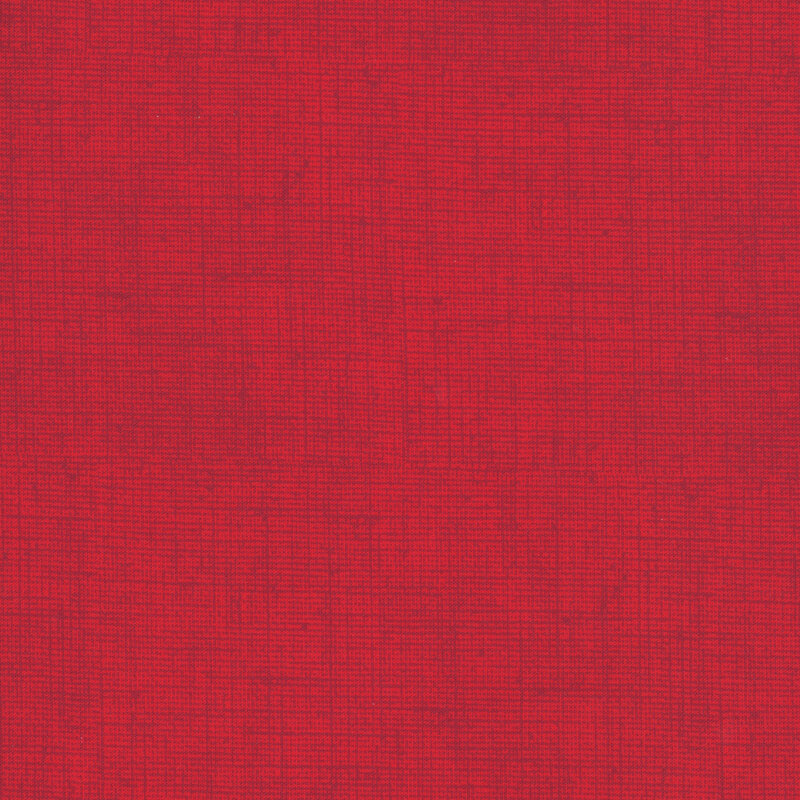Bright ruby red fabric with a woven texture.
