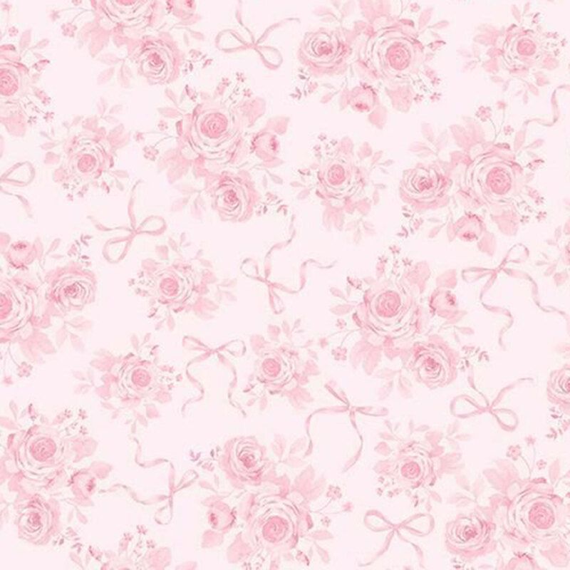 Light blush pink fabric with a tossed pattern of pink bows and pretty rose bouquets. 