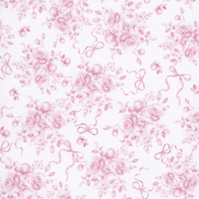 White fabric with a tossed pattern of pink bows and rose bouquets. 