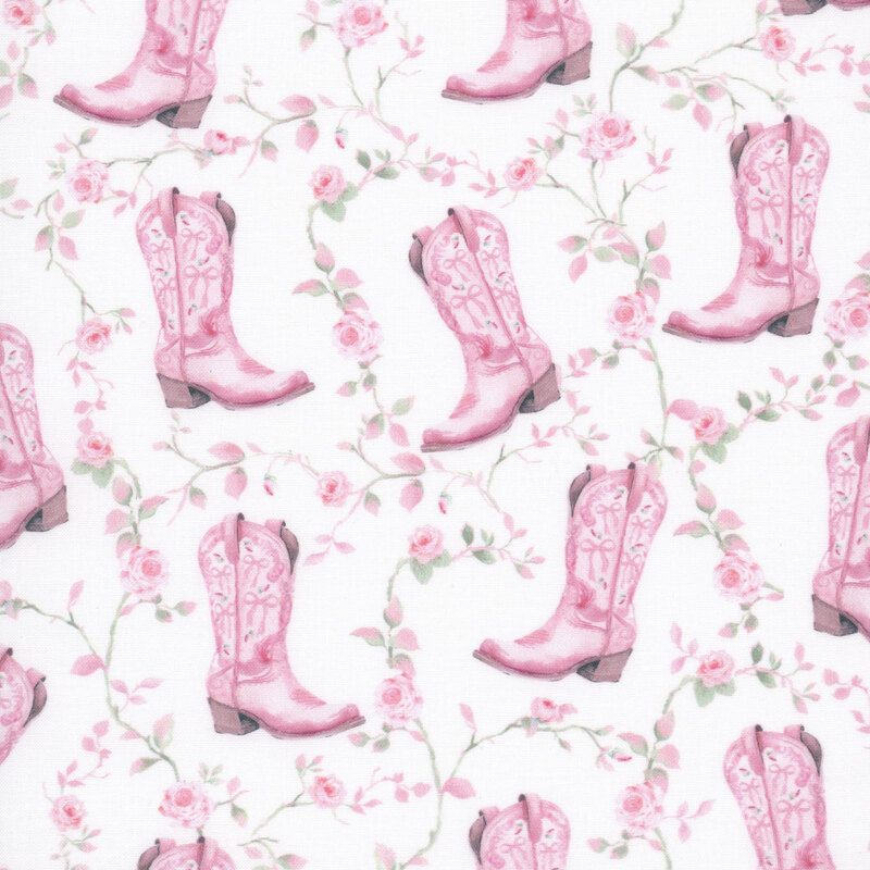 soft white fabric with a pattern of pink cowgirl boots surrounded by green vines with pink roses