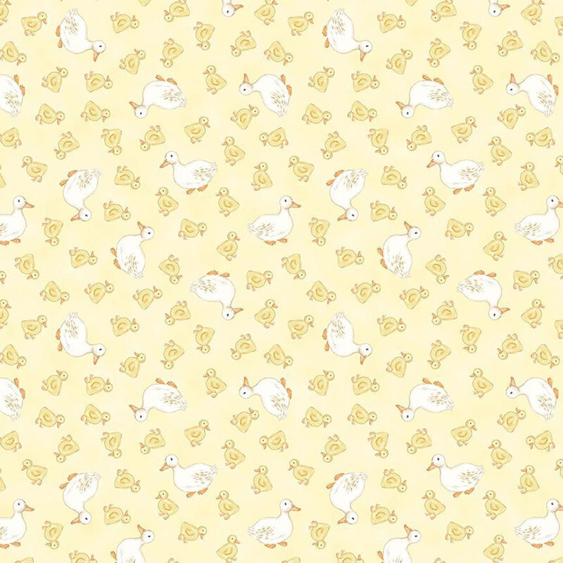 Soft yellow fabric with a hand-drawn style pattern of duck families.