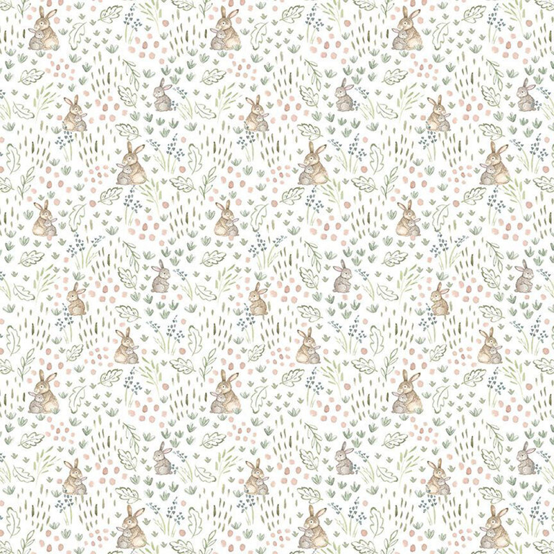 White fabric with a pattern of leaves and stylized bunnies.