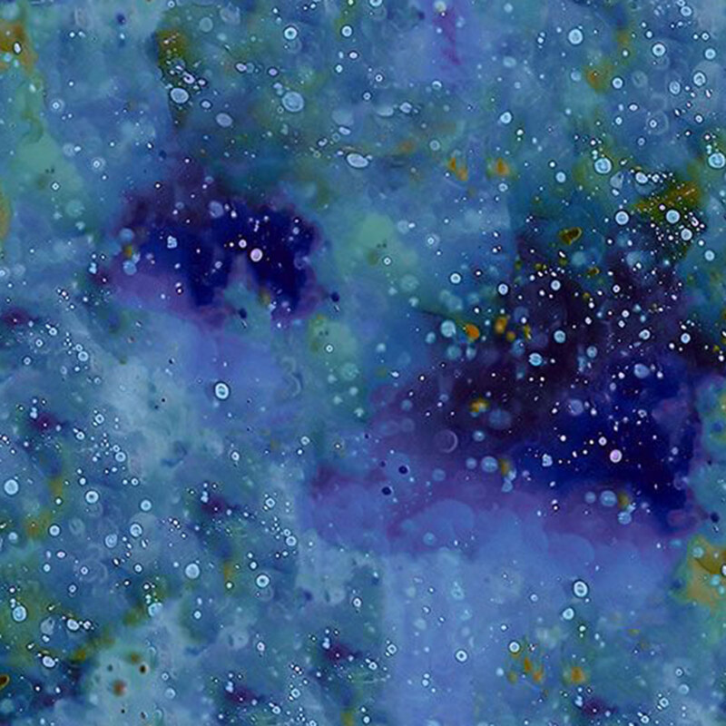 Mottled cobalt fabric features rich layers of deep blue and violet with soft teal undertones and scattered speckles that create a luminous texture.