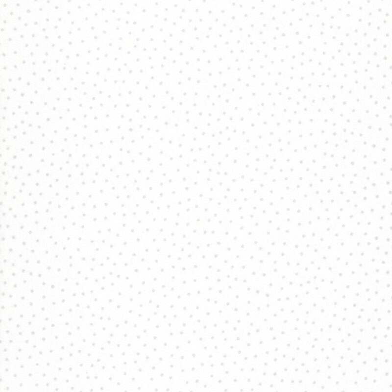 A white fabric with tiny gray polka dots. 