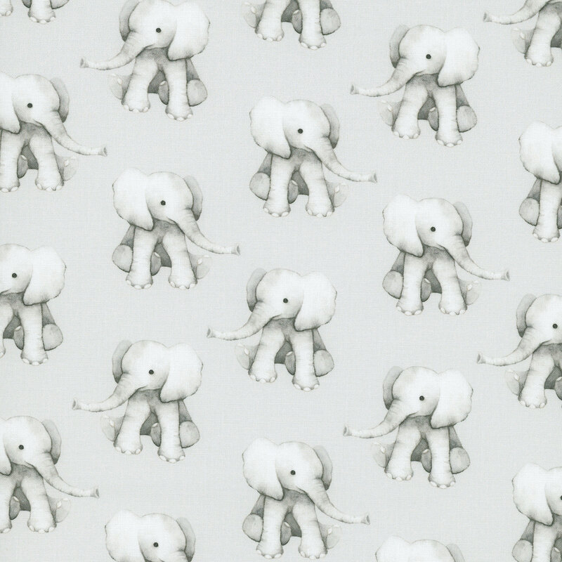 A soft gray fabric with baby elephants in a half drop pattern. 