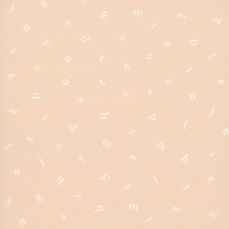 A pastel pink fabric with a tossed design of the alphabet.