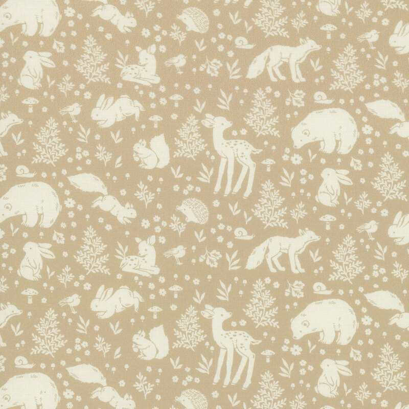 A tonal light brown fabric with motifs of woodland animals surrounded by flowers, fern leaves, and mushrooms.