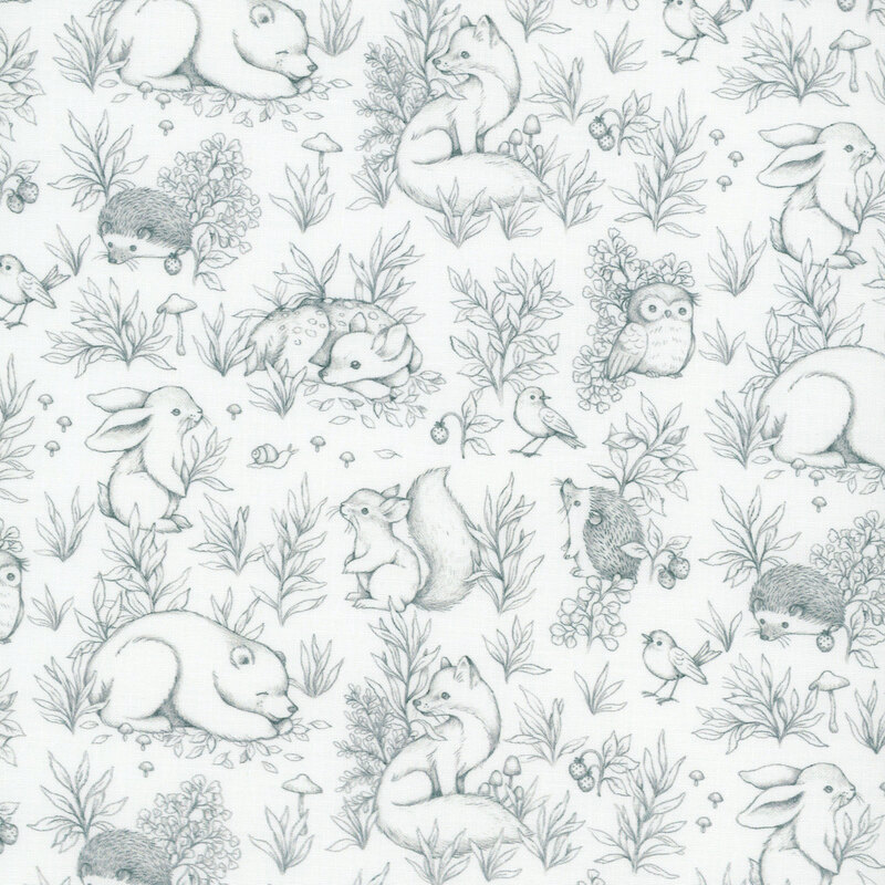 A white fabric with navy blue outlines of woodland animals surrounded by flowers, grasses, and mushrooms in a toile style.