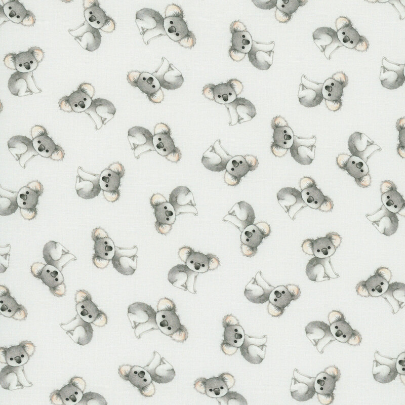A very light blue fabric with tossed kolas bears. 