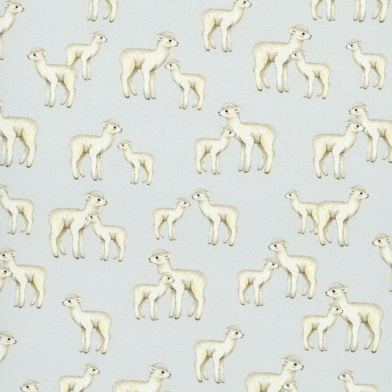 A very light blue fabric with a pattern of baby alpacas. 