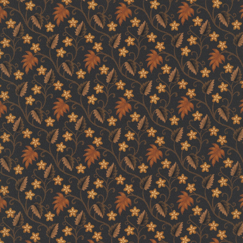Black fabric featuring leaves and flowers in orange and brown with swirling vines.