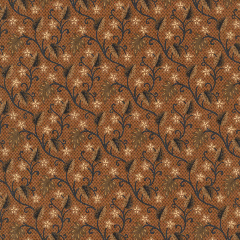 Burnt sienna fabric featuring leaves and flowers in brown and black with swirling vines.