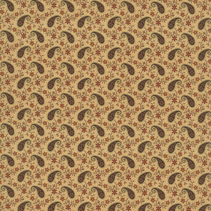 Buff fabric featuring brown floral paisley designs with leafy floral vines and tiny dotted accents.