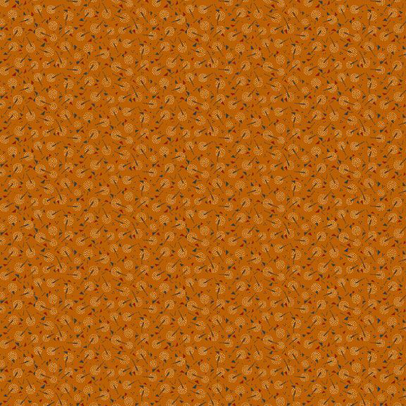 Burnt sienna fabric with a calico pattern of maple winged seeds and dandelion puffs.