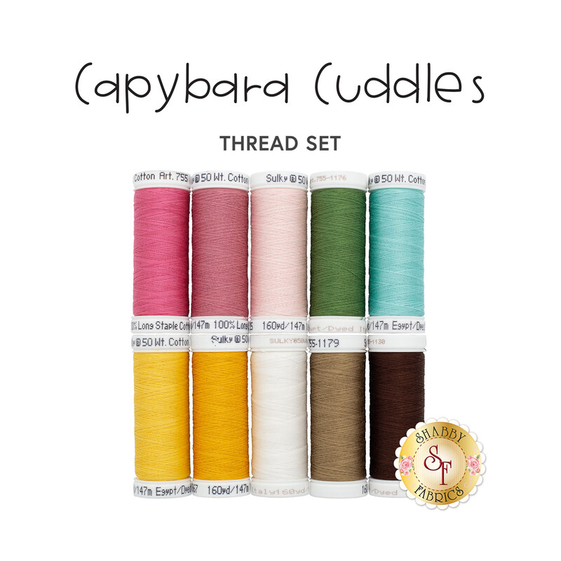 The 10 piece Capybara Cuddles thread set isolated on a white background. A golden Shabby Fabrics logo can be seen in the bottom right corner. 