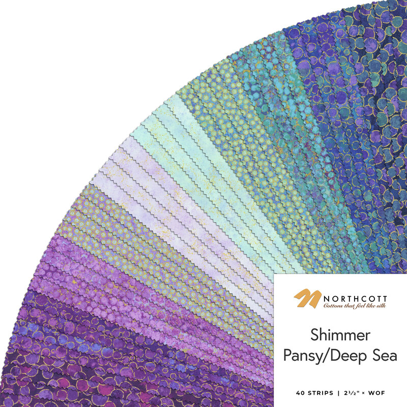 A fanned fabric collage featuring cool toned shimmer fabric from the Shimmer collection by Northcott.