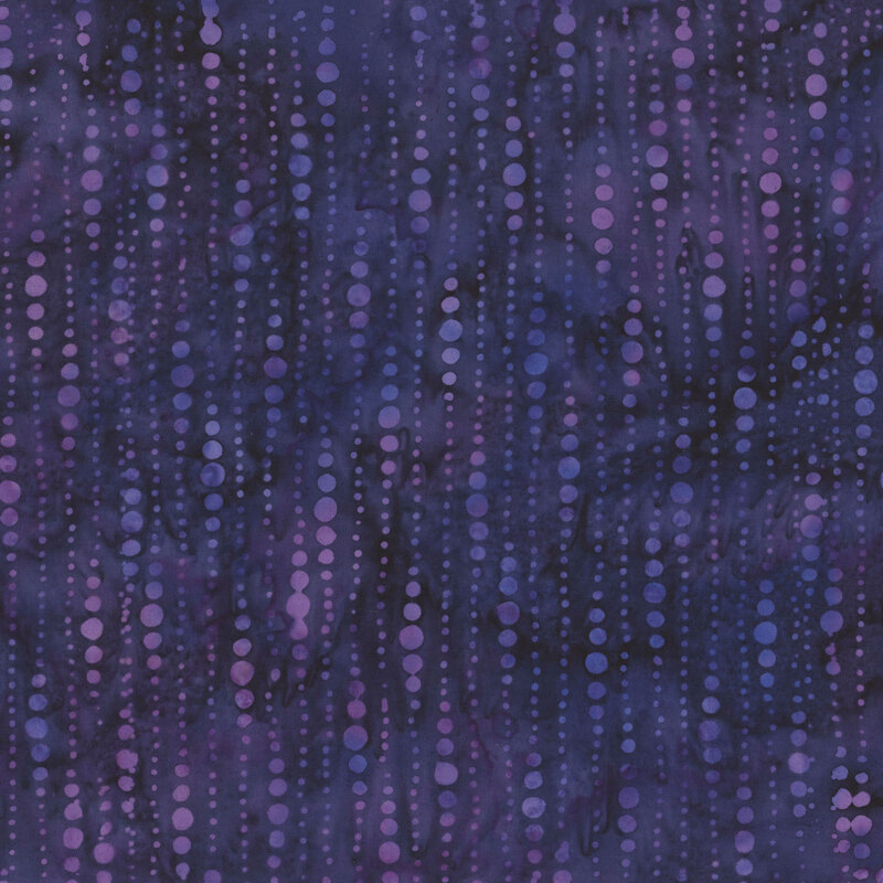 Mottled purple batik fabric featuring beaded curtain of dots in marbled colors of orchid and violet.