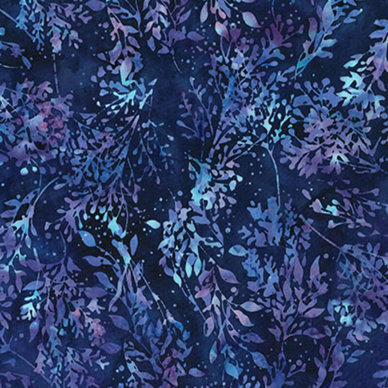 Midnight blue batik fabric featuring leaves in mottled blues and violets.