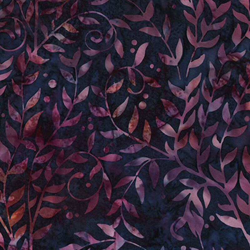 Mottled soft black batik fabric featuring long leafy vines in hues of violet and orange.