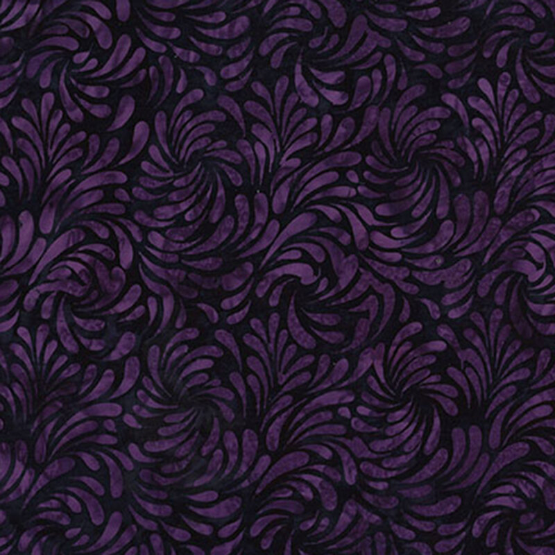 Black batik fabric featuring a swirling design of brush strokes in mottled hues of deep purple.