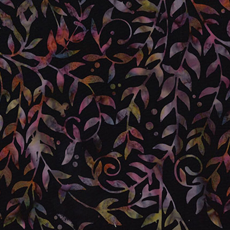 Black batik fabric featuring long leafy vines in muted colors.