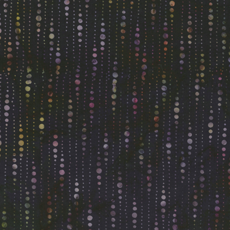 Black batik fabric featuring beaded curtain of dots in marbled colors.