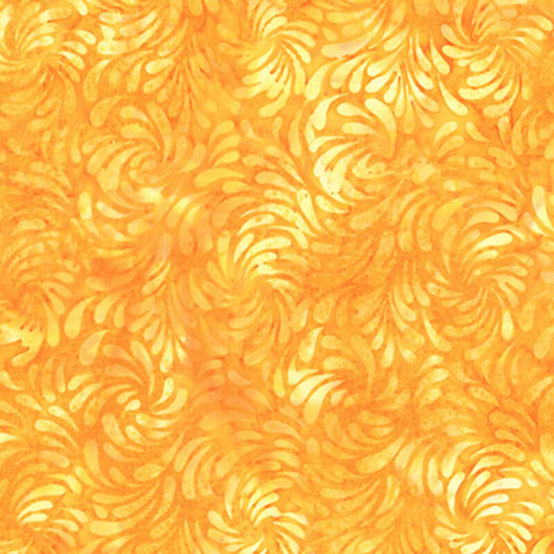 Mottled orange batik fabric featuring a swirling design of brush strokes in mottled hues of yellow.
