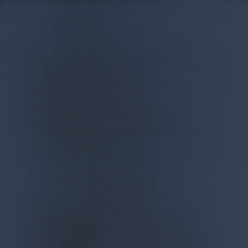 Solid swatch of midnight blue Cuddle fabric.