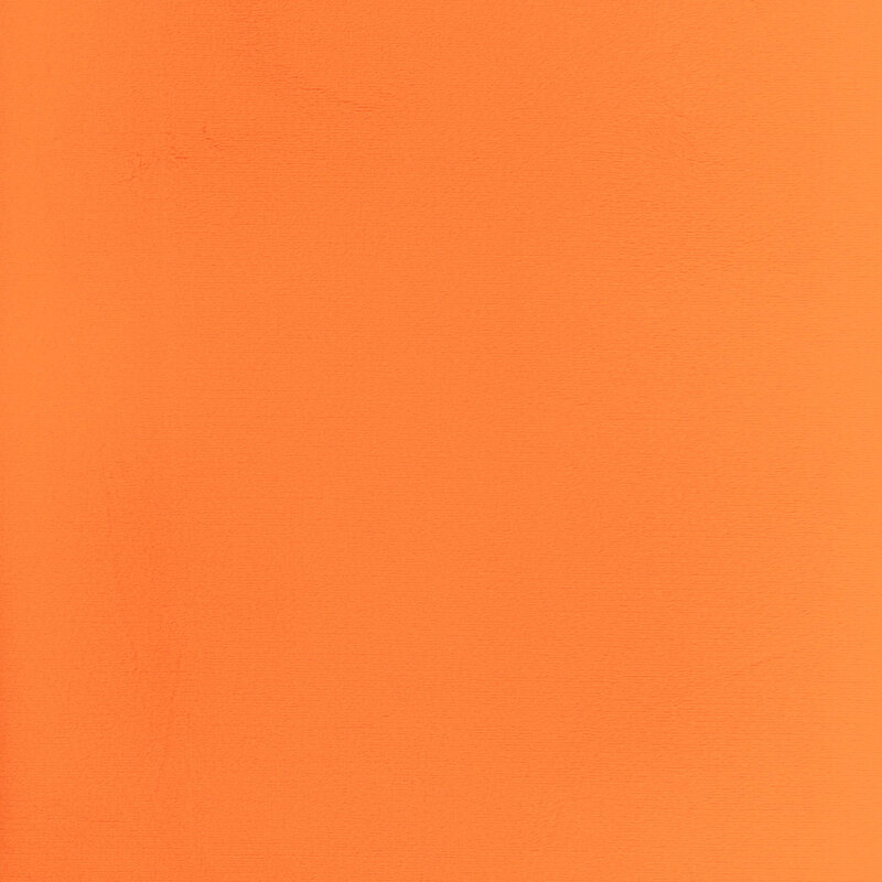 Solid swatch of bright orange Cuddle fabric.