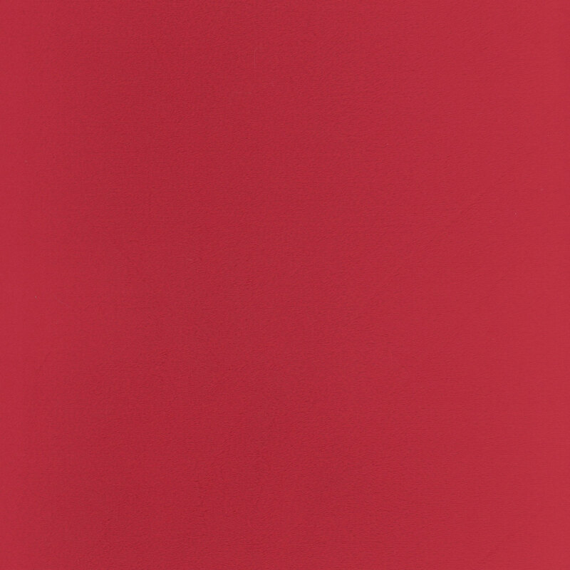 Solid swatch of ruby red Cuddle fabric.
