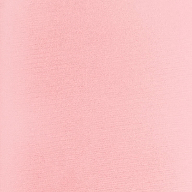 Solid swatch of salmon pink Cuddle fabric.