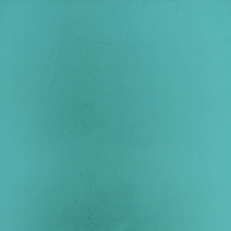 Solid swatch of peacock blue Cuddle fabric.
