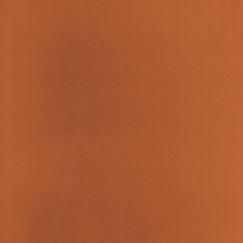 Solid swatch of burnt sienna Cuddle fabric.