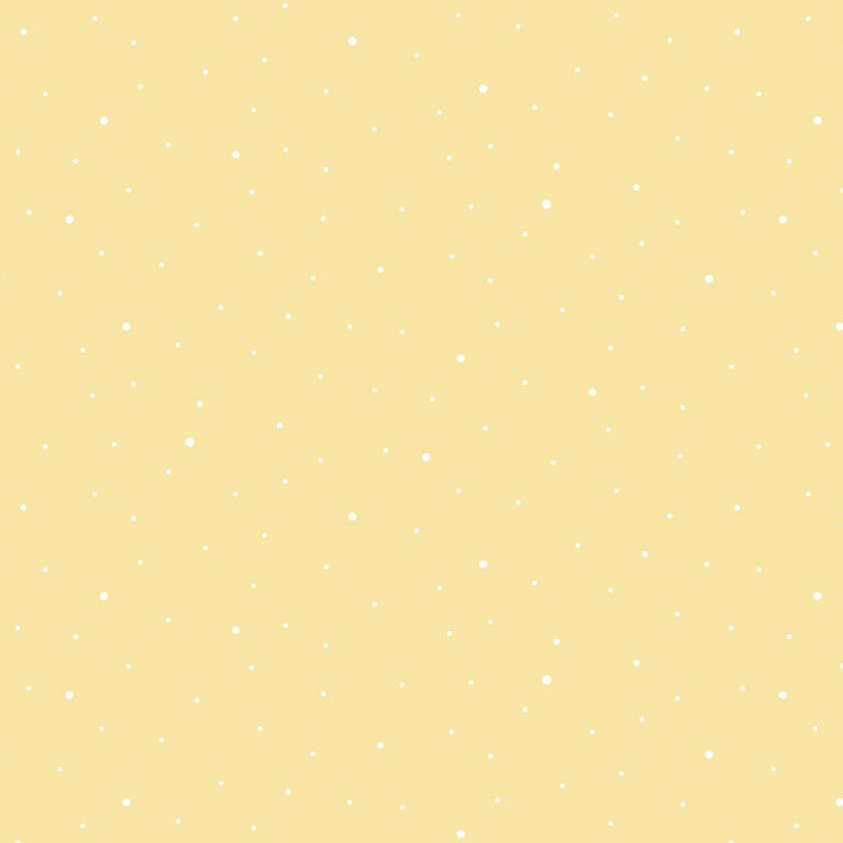 A pastel yellow fabric with scattered small white dots.