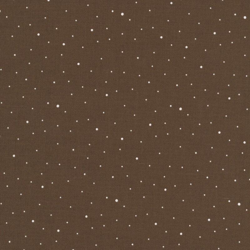 A medium brown fabric with scattered small white dots.