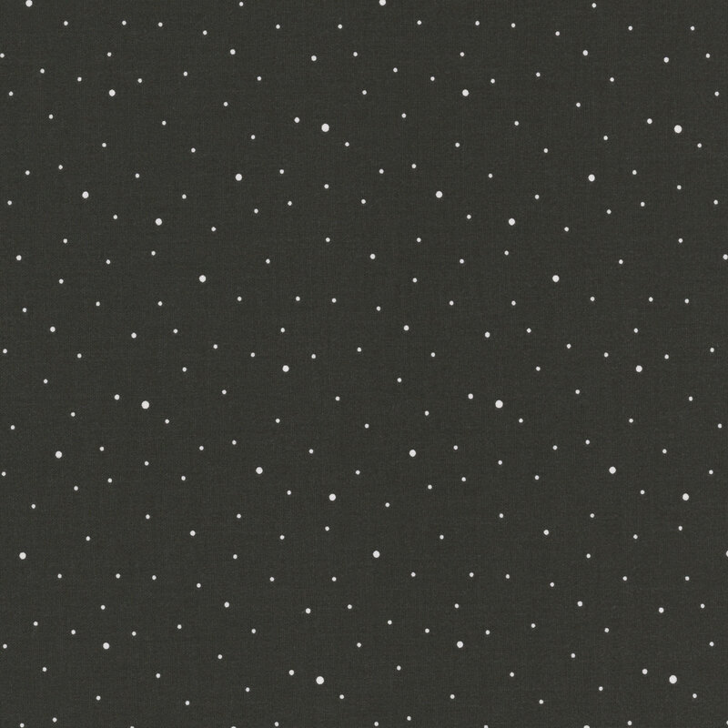 A soft black fabric with scattered small white dots.