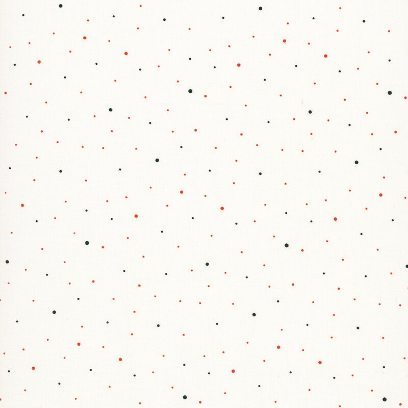 A white fabric with scattered small black and orange dots.
