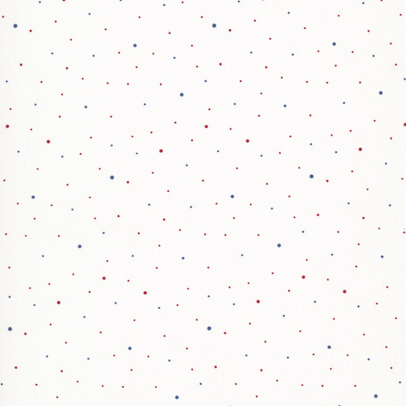 A white fabric with scattered small red and blue dots.