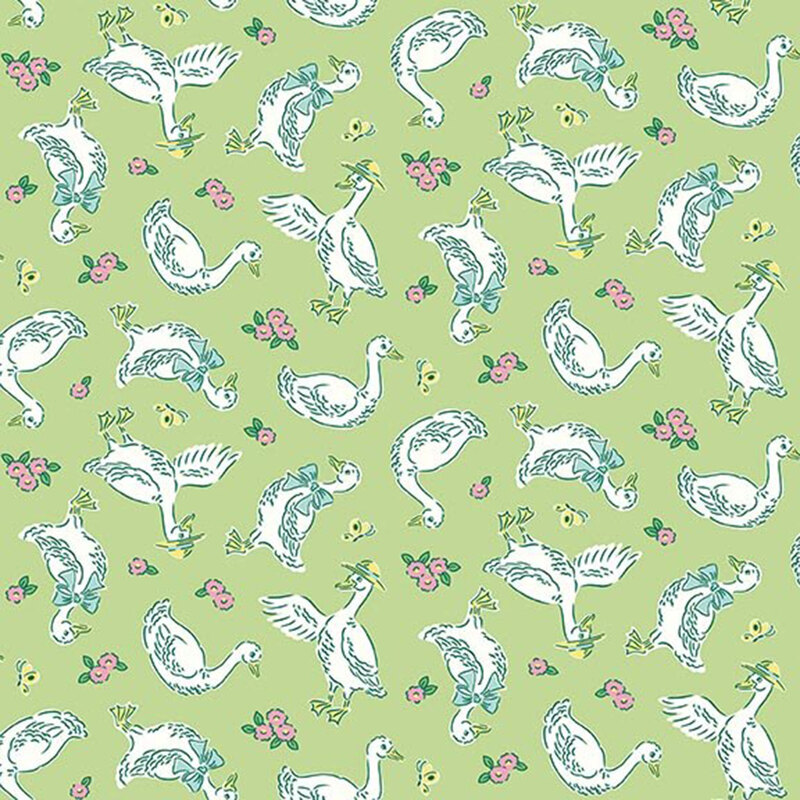 Spring green fabric with a pattern of white geese wearing light blue bows and yellow hats, along with blush pink and pale yellow flowers