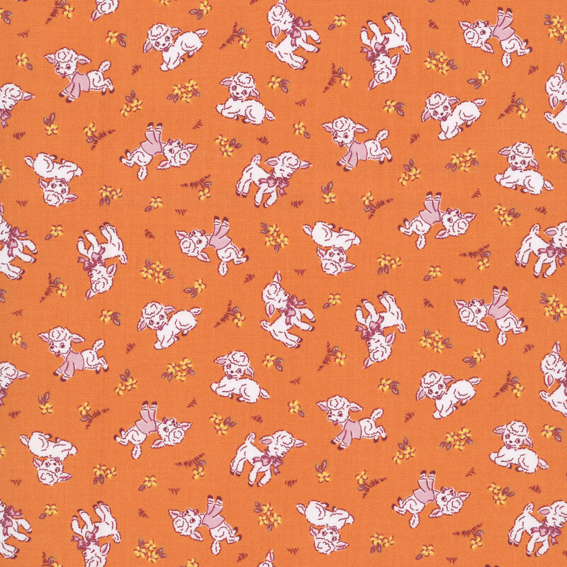 Cadmium orange fabric with a cute pattern of snow white lambs wearing very light pink sweaters and bows, along with small yellow flowers