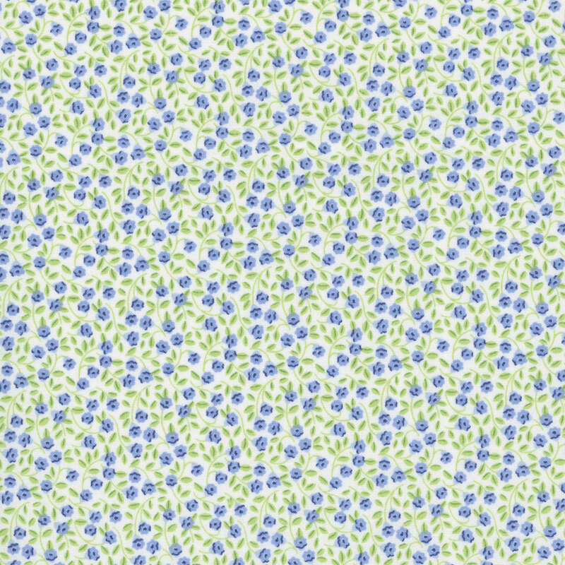 White fabric with a calico floral pattern of small periwinkle blossoms and spring green vines 