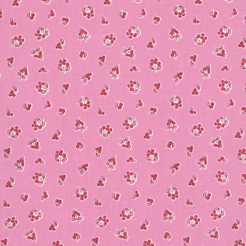 Bubblegum pink fabric with a pattern of red berries