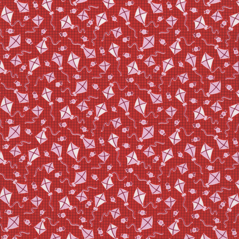 scarlet red fabric features a breezy design of blush pink and white kites, along with tiny pink florals