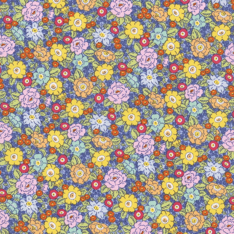 Dense multicolor floral fabric in pale yellow, orange, red, and navy blue on an aquamarine background