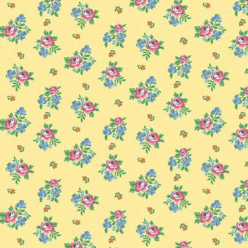 Vintage inspired fabric with bunches of pink roses and blue flowers, small pink floral buds, and pin dots on a daffodil yellow background