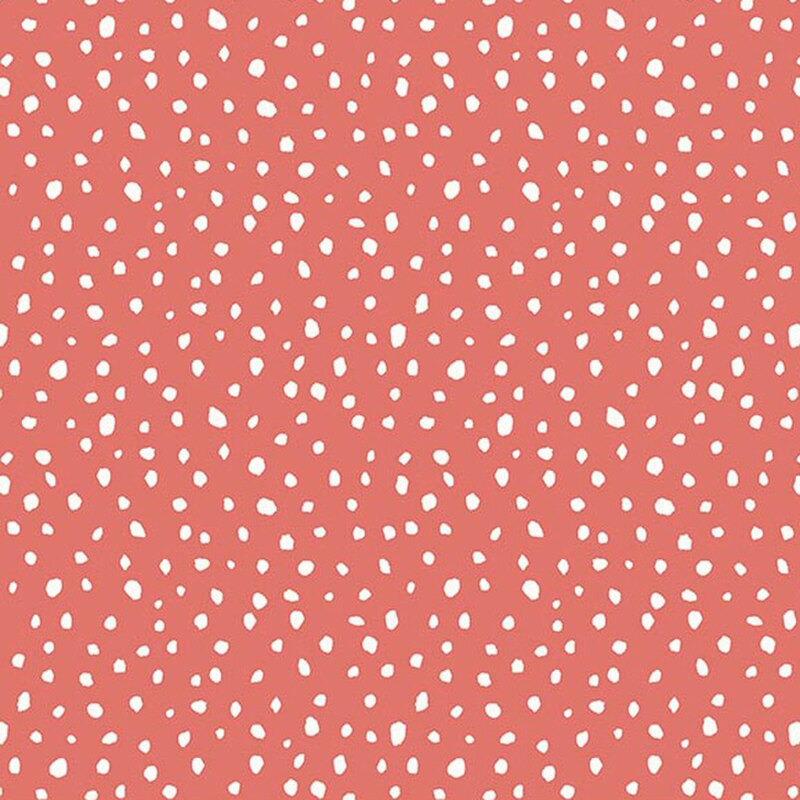 Rouge red fabric with scattered white abstract dots.
