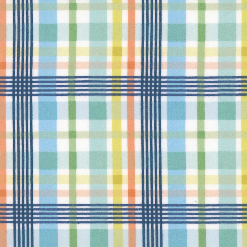White fabric with a turquoise, navy, green, yellow, and orange madras plaid pattern